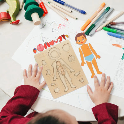 Toddler playing with Montessori Human Body Jigsaw Puzzle