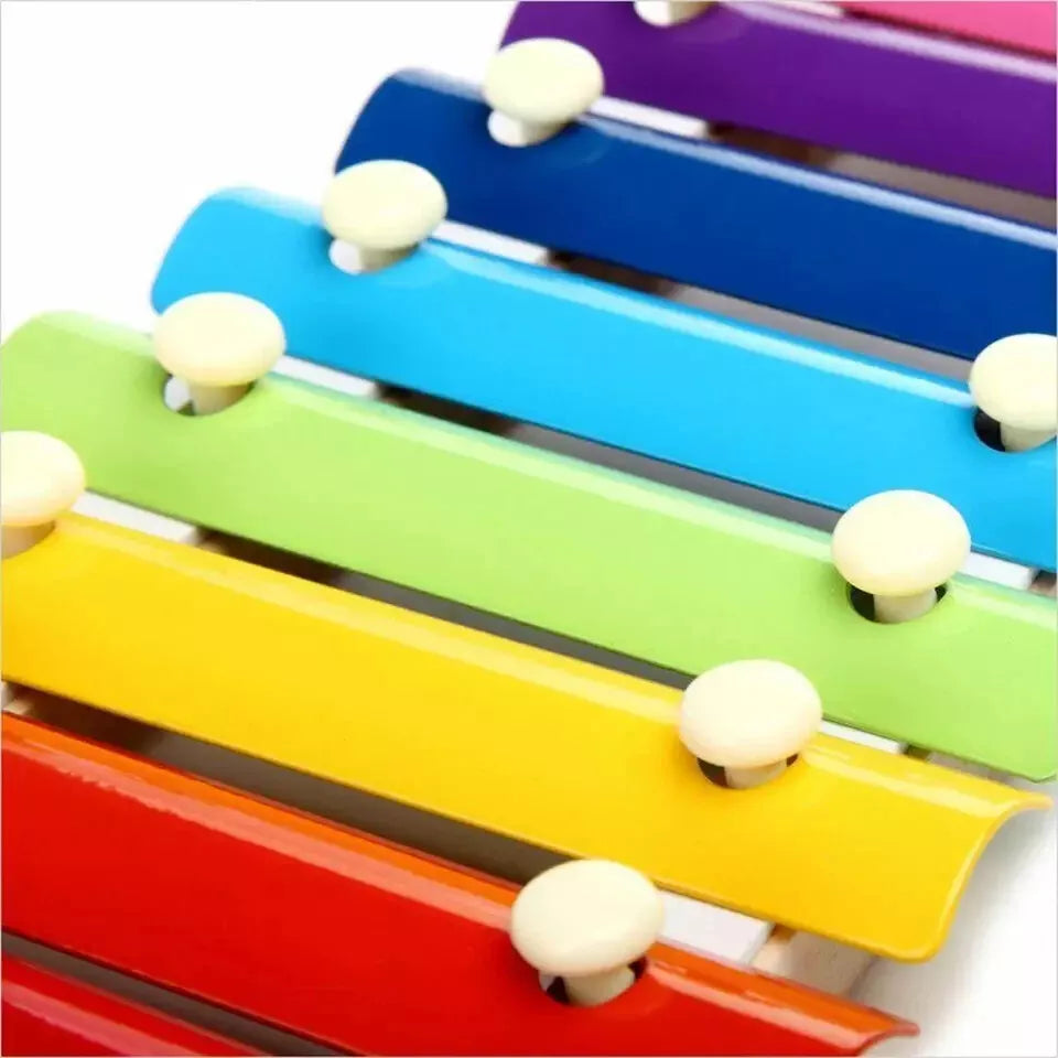 Close-up of the Montessori Wooden Music Instrument on display, highlighting its materials and vibrant colors.